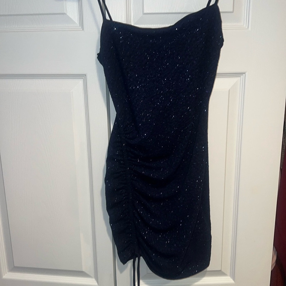 Sparkly navy dress. Size medium. Tie on side to make higher or lower. Worn once.